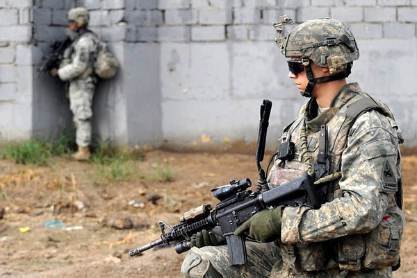 an american soldier dressed in camouflage