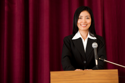 a woman giving a presentation