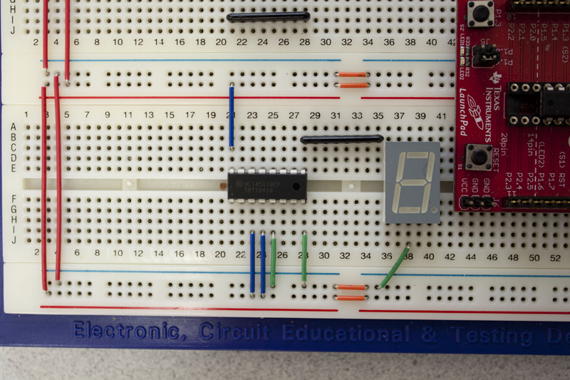 shows Vcc to decoder pins 1, 13, and 14 and ground to decoder pins 9 and 12 and display pin 8