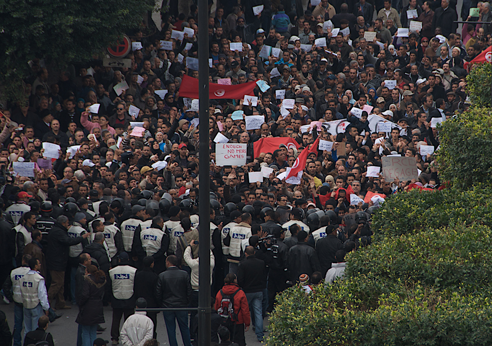 A large group of people marching in protest.