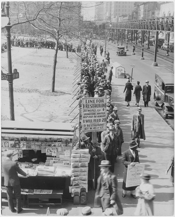 aIn figure (a), a black and white photo of people standing in a depression-era breadline is shown.