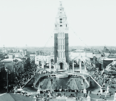 A photograph shows the Dreamland Amusement Park tower at Coney Island.