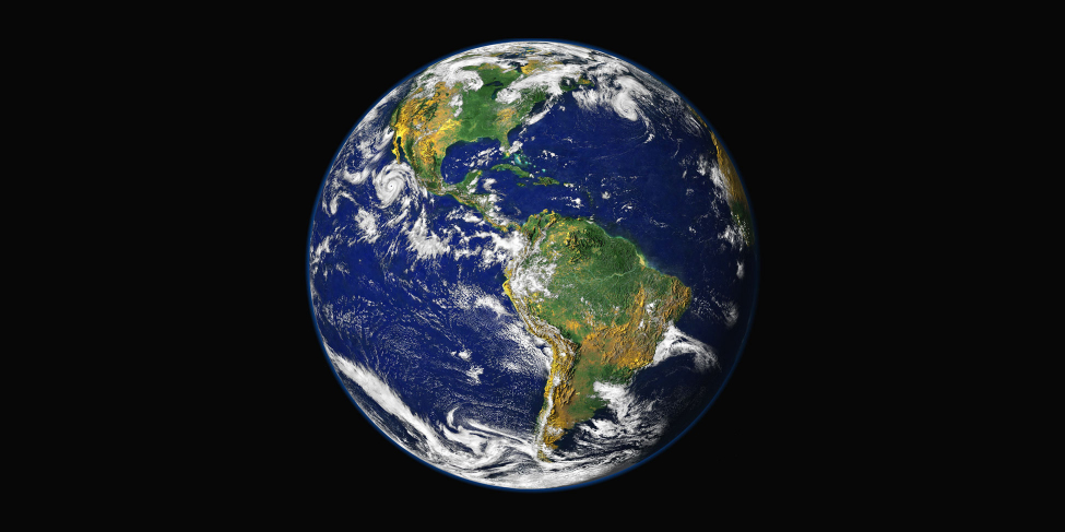 Composite Satellite Image of the Earth. North and South America are seen, as are the Atlantic and Pacific Oceans. Numerous cloud formations are scattered across the face of the globe.