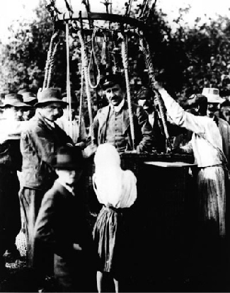 Photograph of Victor Hess standing in the gondola of his research balloon.