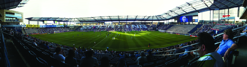 An image of the inside of a stadium. The stands are filled with people.