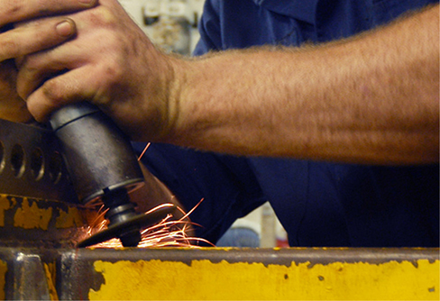 A photograph of a grinding wheel being used.