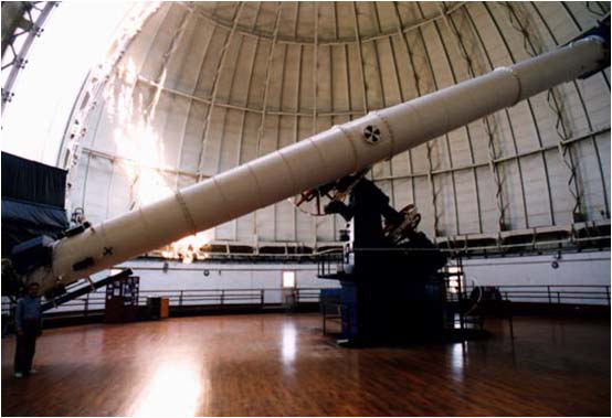 Photograph of a telescope in an observatory.