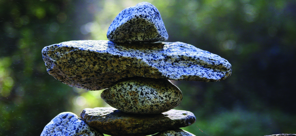 This is a photo of several rocks carefully stacked to achieve balance.